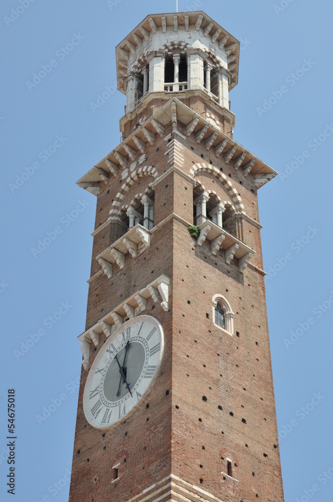 Lamberti Tower in Verona against the blue sky