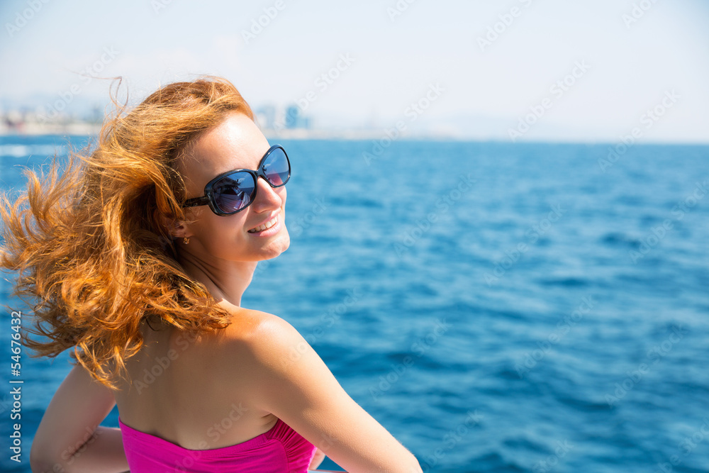 Young woman against sea Young woman against sea