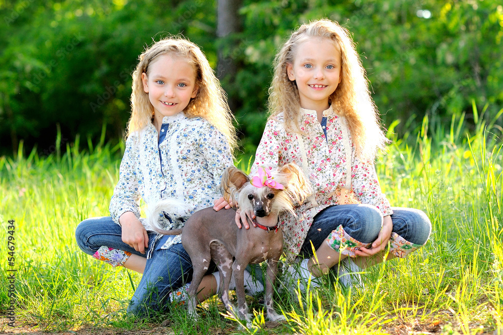 Portrait of two little girls twins