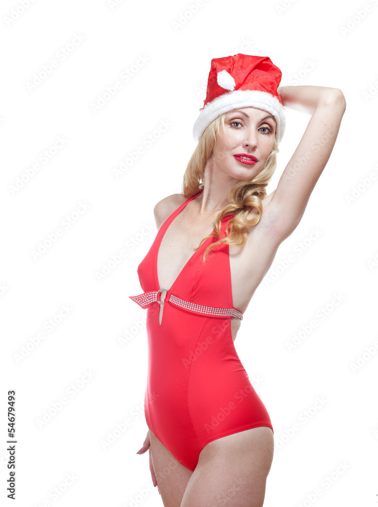 beautiful woman inred bathing suit and red cap of Santa Claus beautiful woman inred bathing suit and red cap of Santa Claus