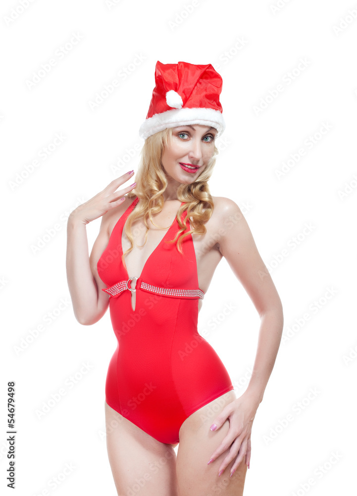 beautiful woman inred bathing suit and red cap of Santa Claus beautiful woman inred bathing suit and red cap of Santa Claus
