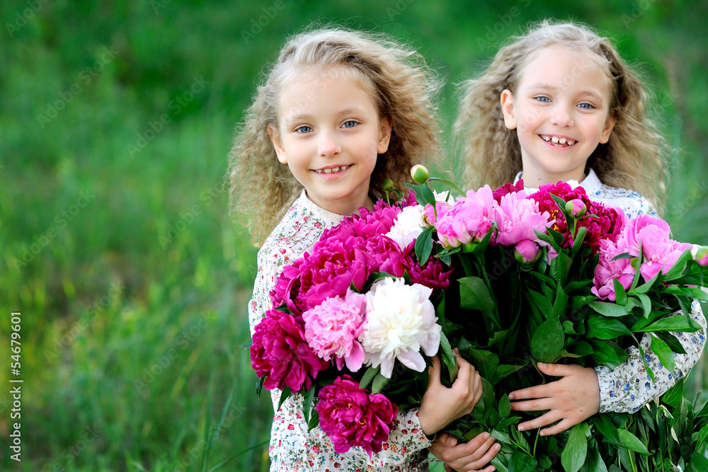 portrait of two twins with peonies portrait of two twins with peonies