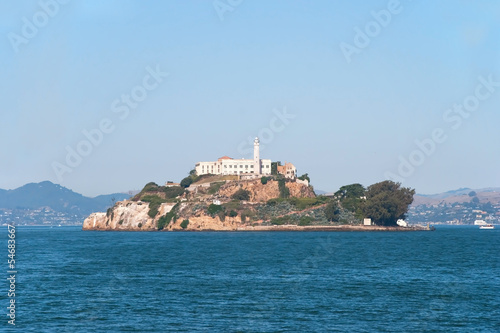 Alcatraz jail island in San Francisco bay with a beautiful blue