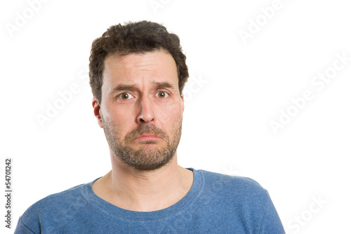 Mature Caucasian man in casual clothing, isolated on white, sad © MichaelJBerlin