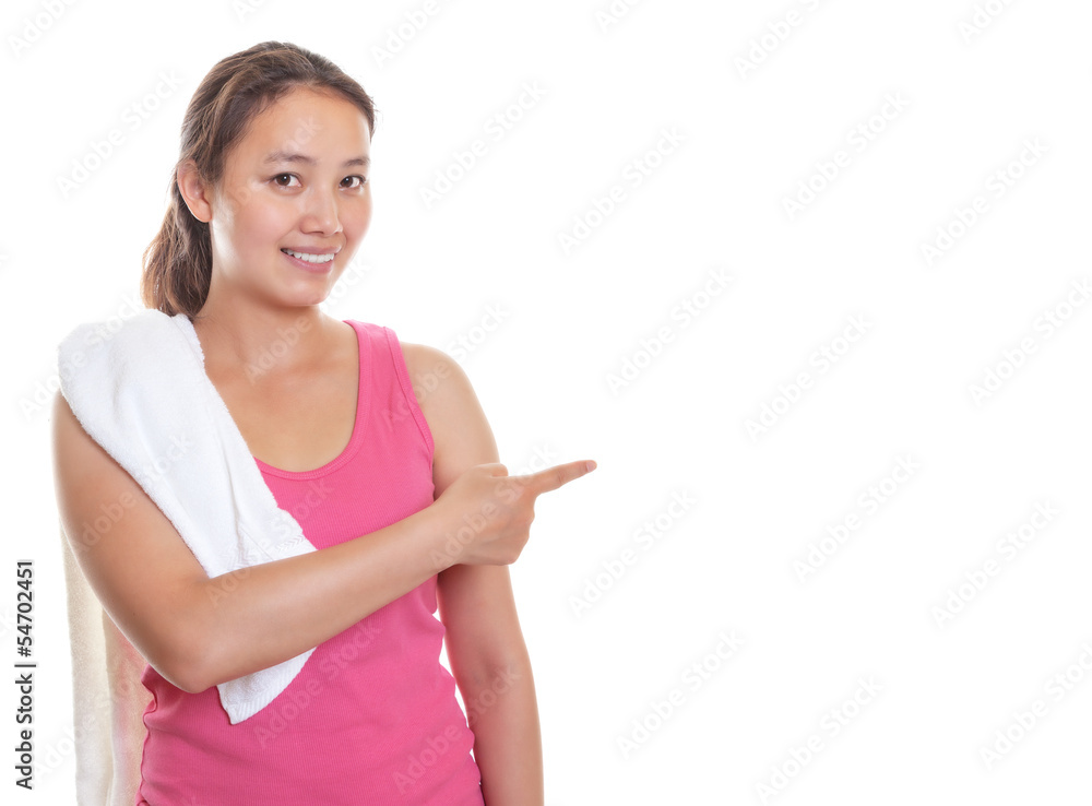 Sporty asian girl pointing to the right Sporty asian girl pointing to the right