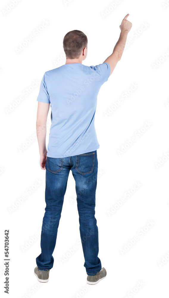 Back view of pointing young men in shirt and jeans. Back view of pointing young men in shirt and jeans.