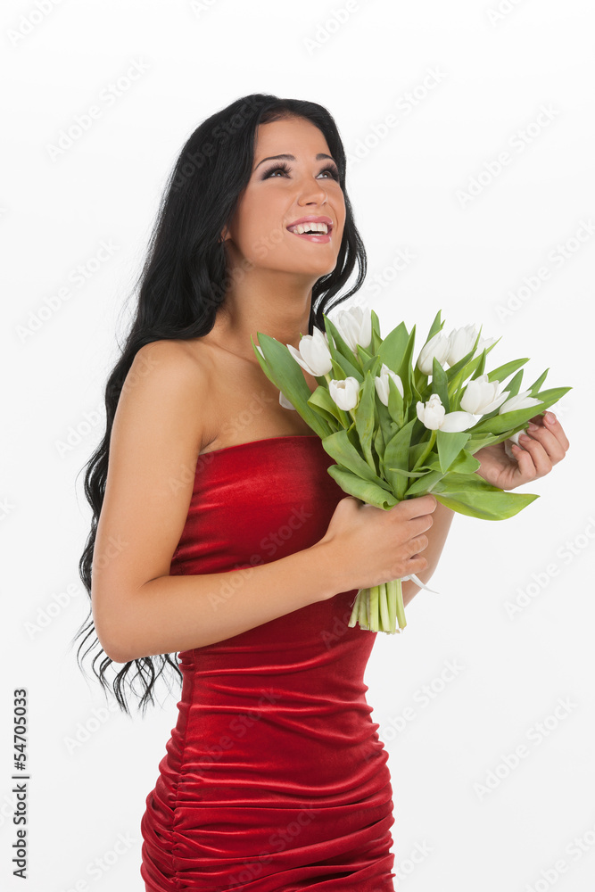 Happy women with flowers. Attractive young woman holding a bunch Happy women with flowers. Attractive young woman holding a bunch