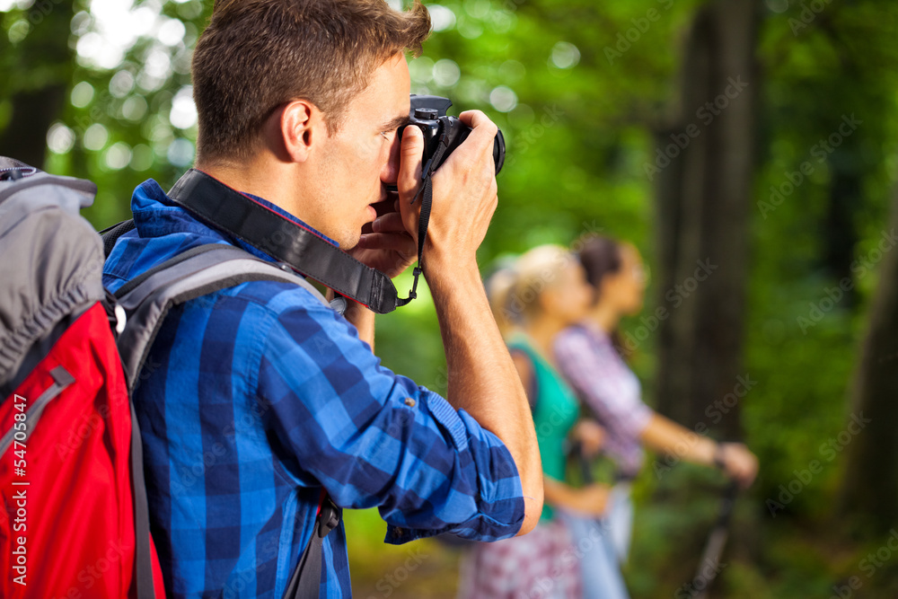 Hiking photographer taking pictures Hiking photographer taking pictures