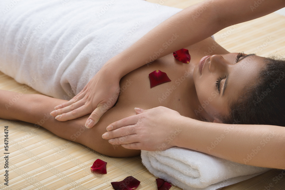 Beauty treatment at SPA. Beautiful young women getiing massage Beauty treatment at SPA. Beautiful young women getiing massage