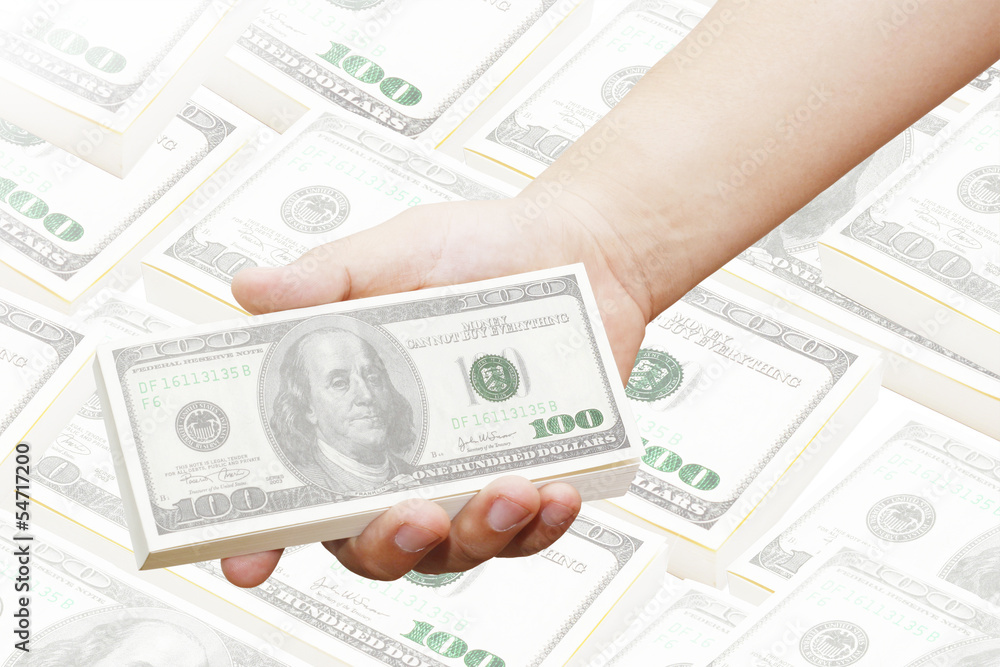 hand of a man holding 100 dollar bills hand of a man holding 100 dollar bills