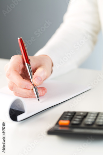 Hand writing down notes Fototapeta
