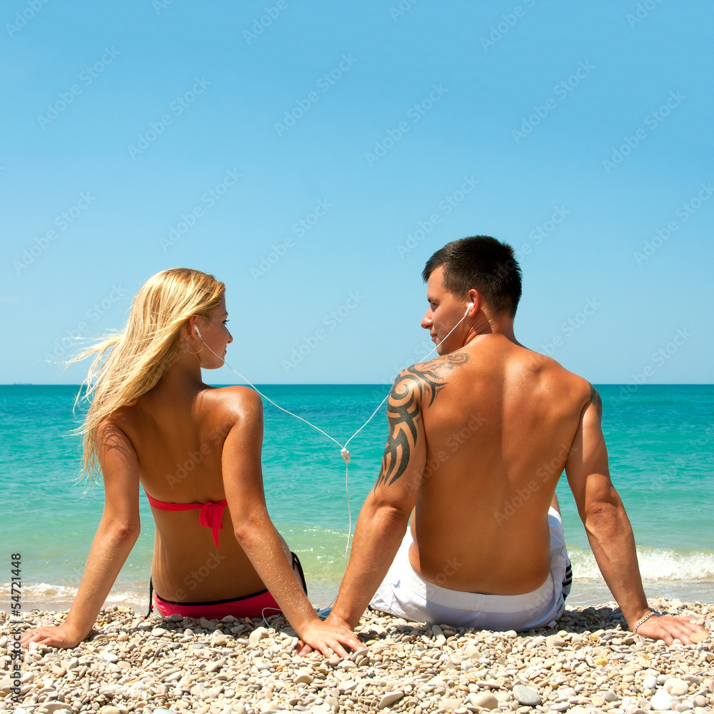 Young couple in the beach Young couple in the beach