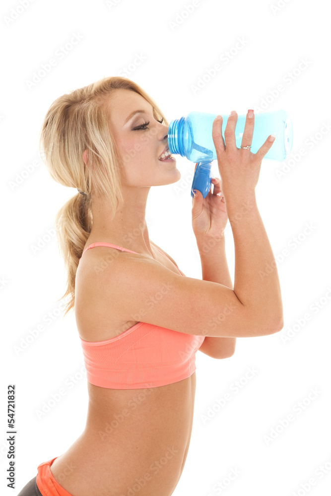 woman fitness orange sports bra water bottle drink