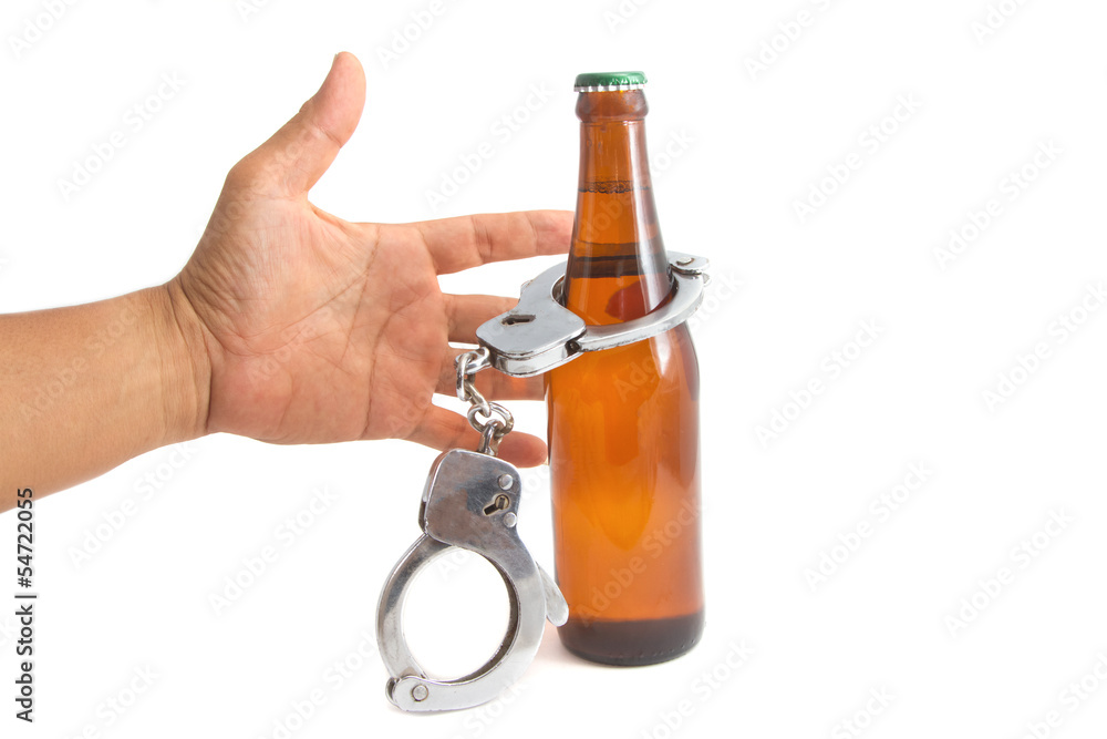 bottle beer and handcuffs,Drunk driving concept bottle beer and handcuffs,Drunk driving concept