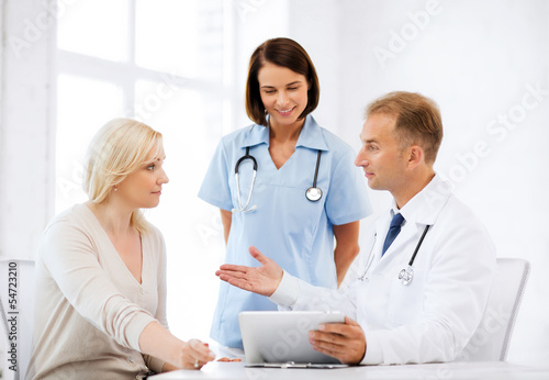 doctor and nurse with patient in hospital