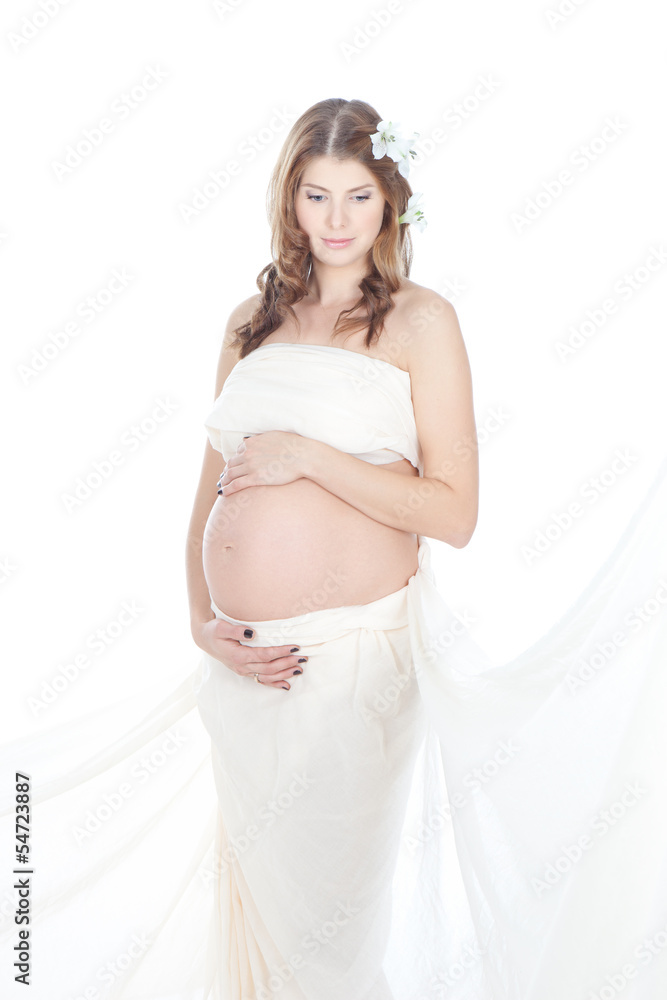 Beautiful pregnant woman in white sheet Beautiful pregnant woman in white sheet