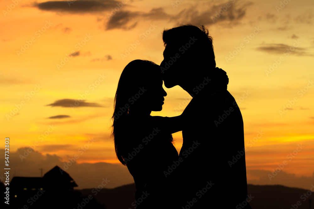 romantic Scene of love couples partners on the Beach before suns