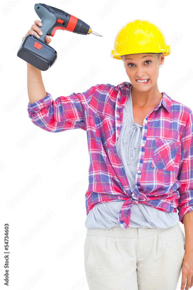Attractive handy woman holding a power drill Attractive handy woman holding a power drill