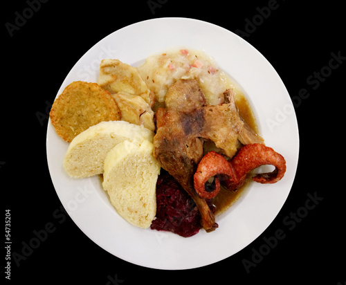 Assortment of meats, turkey and sauerkraut - traditional Czech d photo