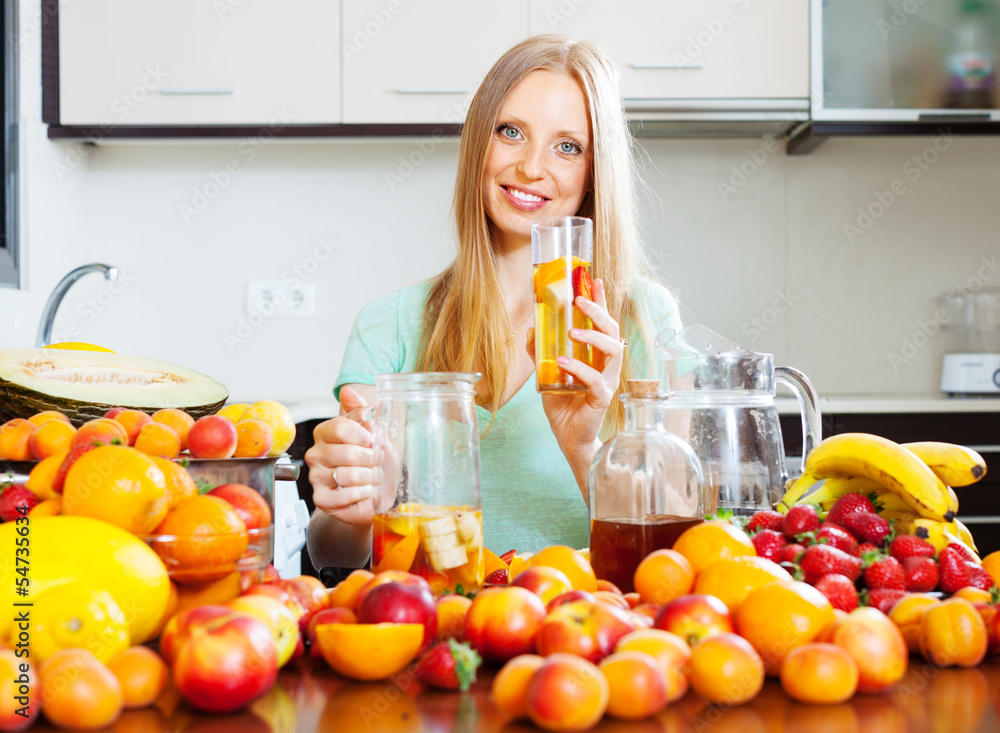 woman with fresh fruit beverage