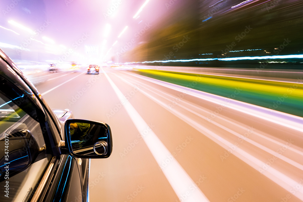 Fototapeta premium Car driving fast