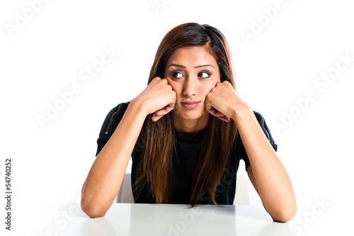 Young beautiful unhappy Asian Indian teenager