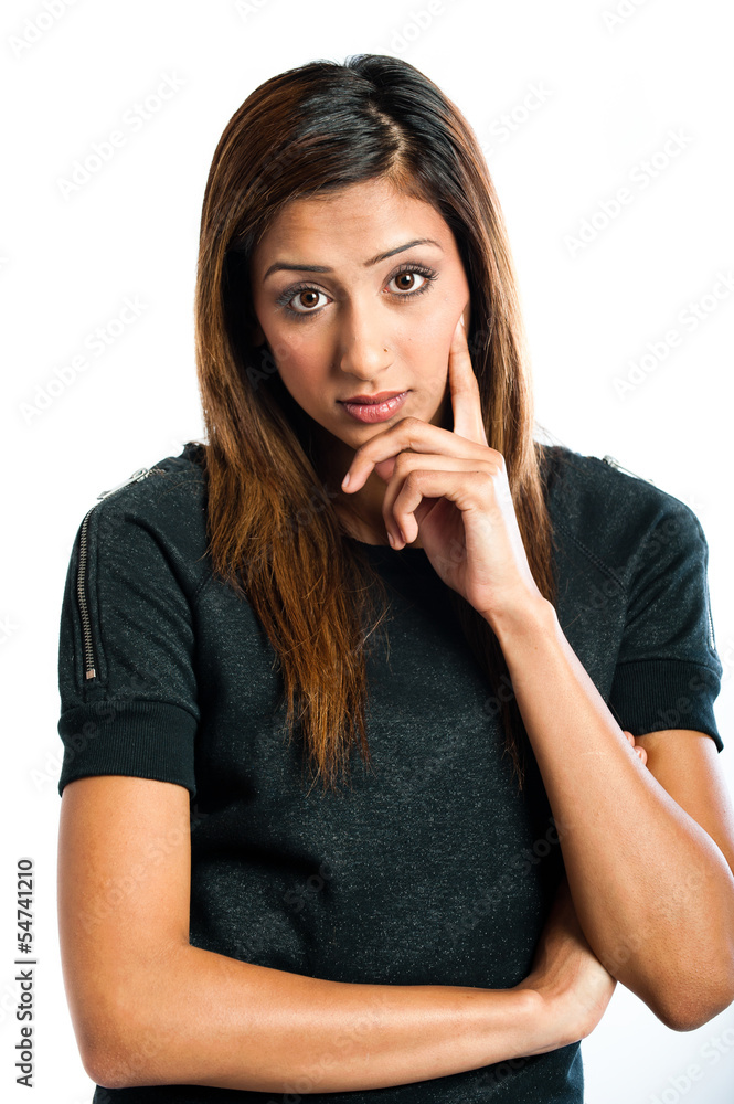 Beautiful young Indian model in a thoughtful pose Beautiful young Indian model in a thoughtful pose
