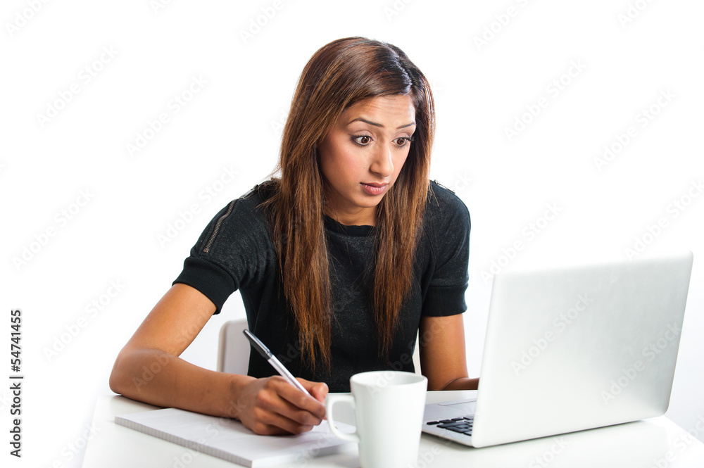 Beautiful Asian Indian teenage woman, studying with laptop Beautiful Asian Indian teenage woman, studying with laptop