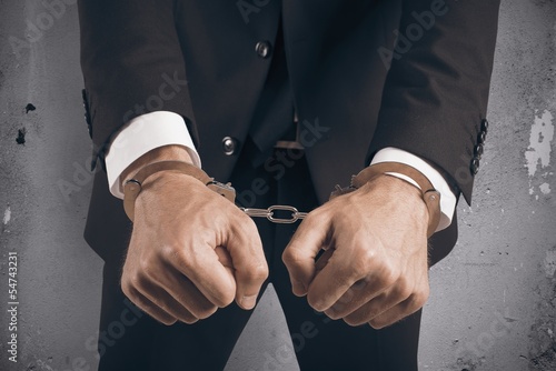 Fotografia Businessman handcuffed