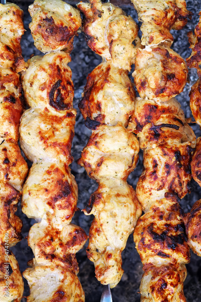 Shish kebab close-up. Slices of meat in marinade