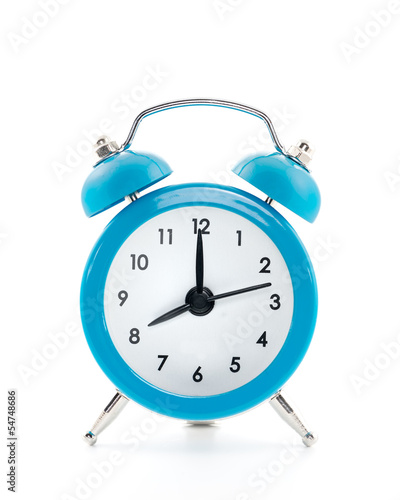 Blue old style alarm clock isolated on white background