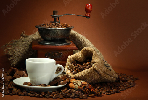 cup of coffee, grinder, turk and coffee beans