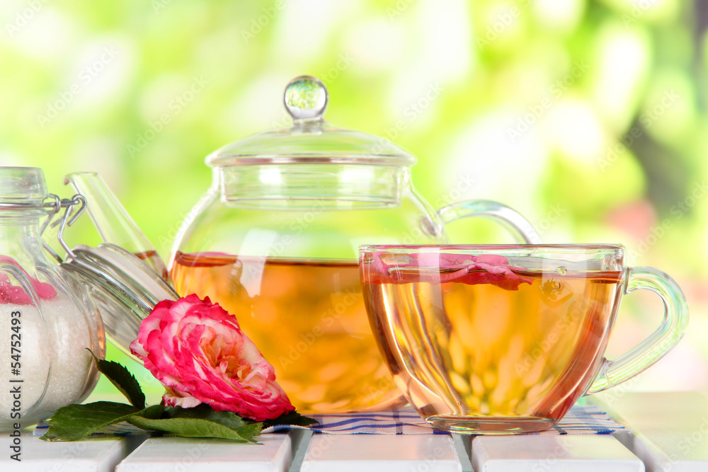 Kettle and cup of tea from tea rose Kettle and cup of tea from tea rose