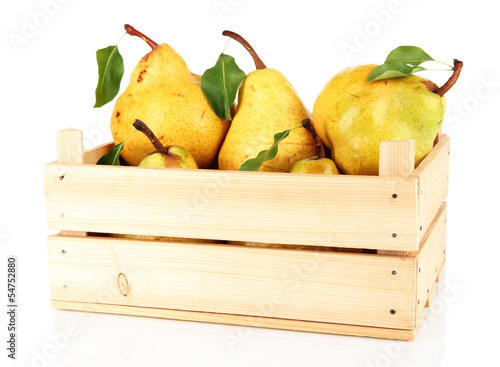 Juicy pears in wooden box isolated on white