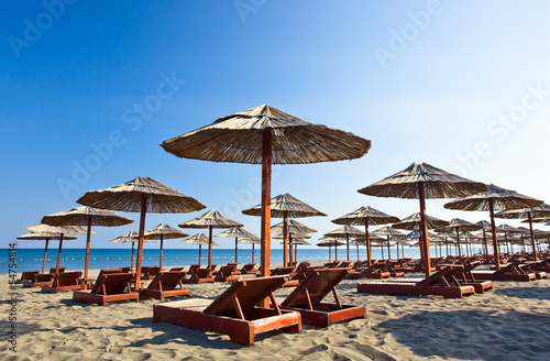 sunbeds and parasols on the beach