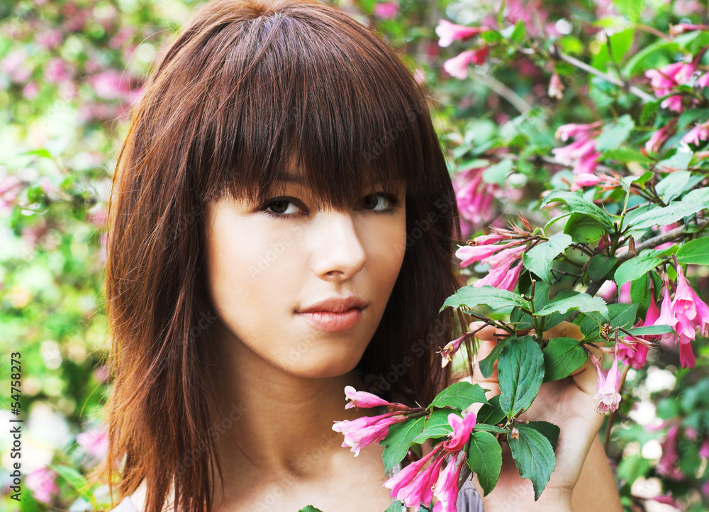 Naklejka premium Girl ang flowers