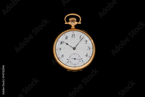 Gold Pocket watch isolated on black background