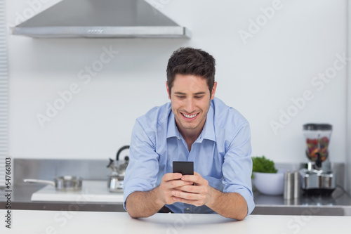 Man texting with his smartphone
