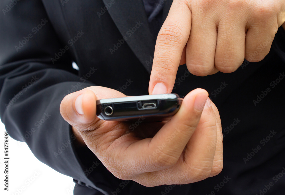 Flat cell phone in business man hand Flat cell phone in business man hand