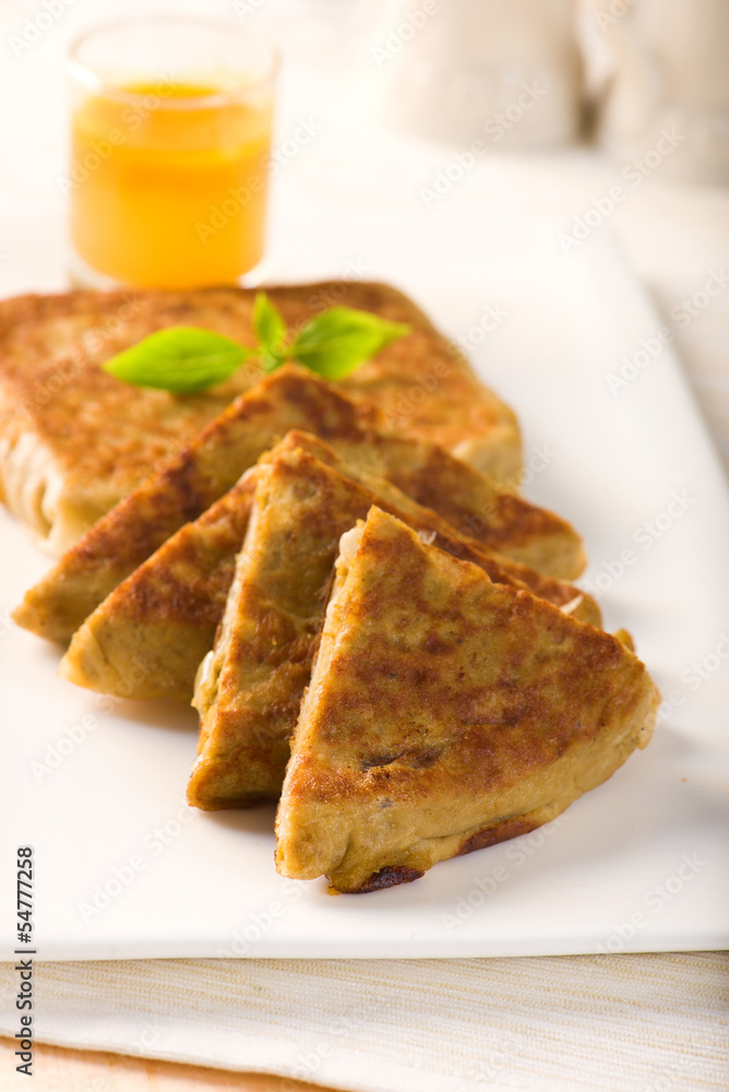 mutabbaq a popular arab food where bread if stuffed with meat mutabbaq a popular arab food where bread if stuffed with meat
