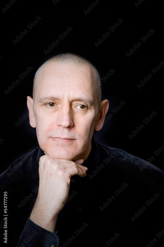 Portrait of a caucasian man on black background Portrait of a caucasian man on black background