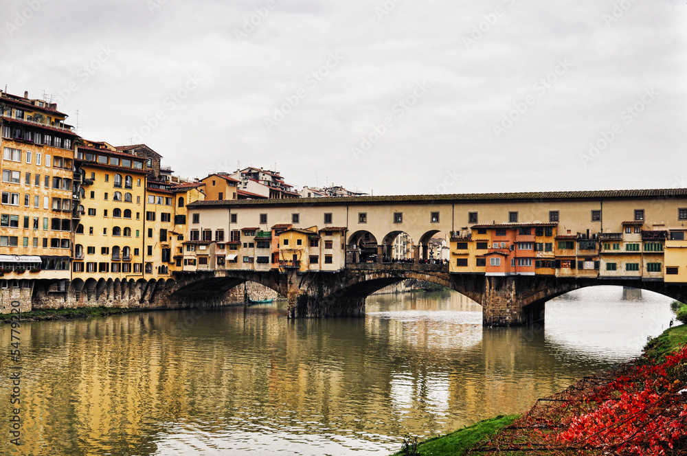 Fototapeta premium Florence with reflections in the Arno River. Italy
