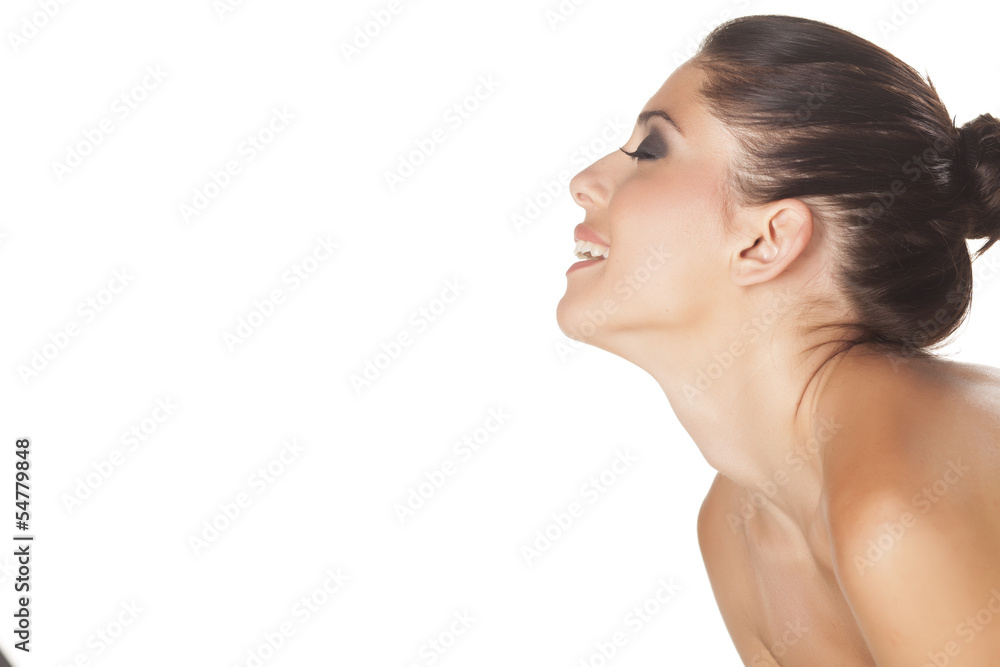 Side view of beautiful brunette posing on white background Side view of beautiful brunette posing on white background