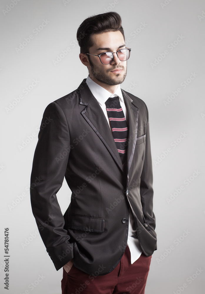 Fototapeta premium sexy man dressed elegant with s sock tie - funny concept