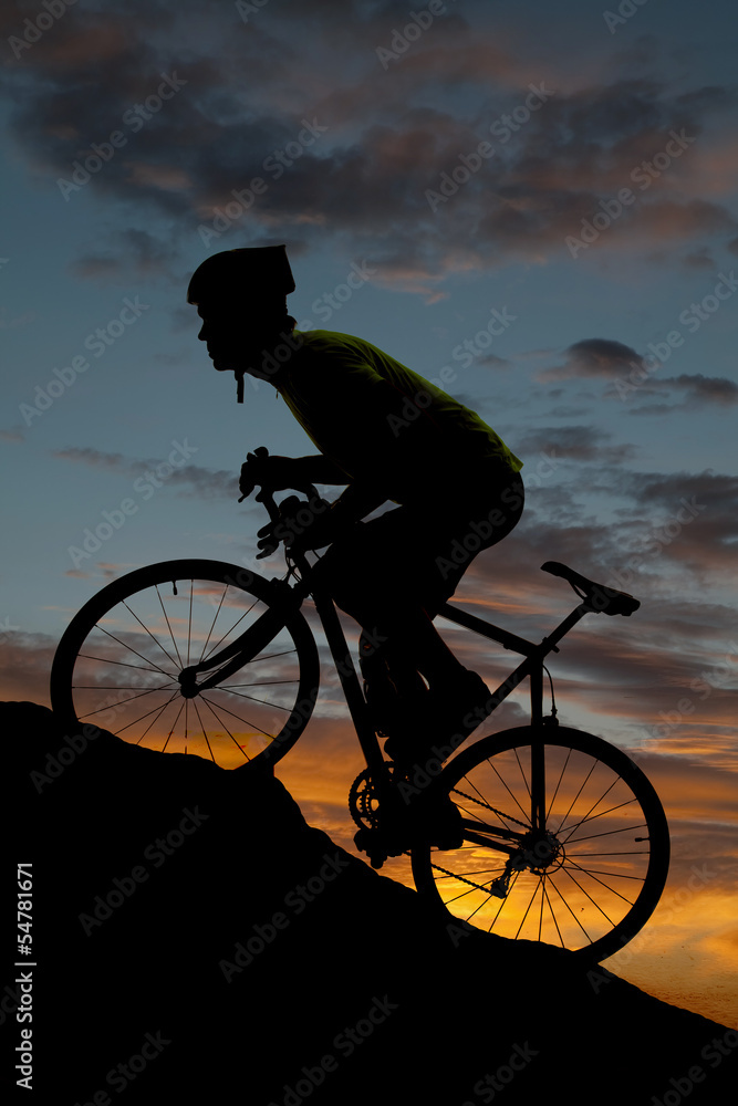 Obraz premium Silhouette road bike uphill