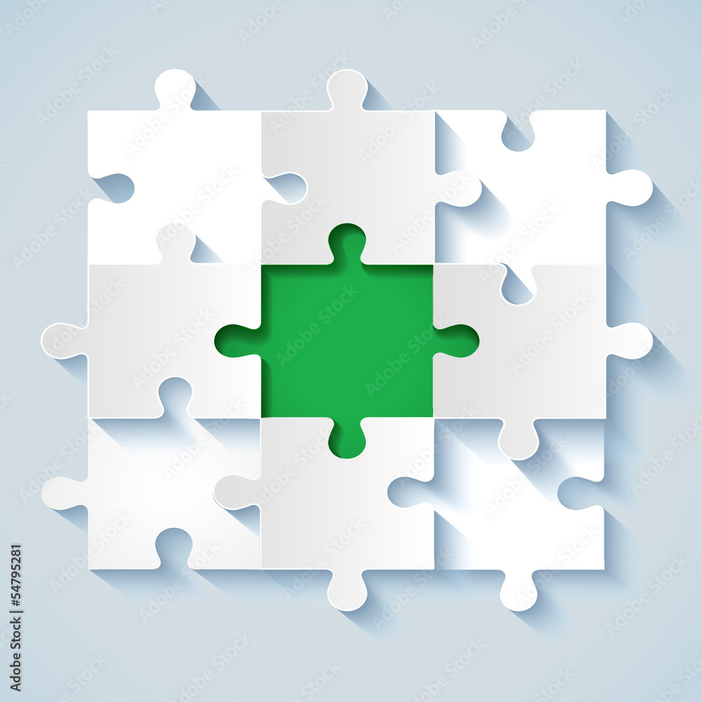 Paper puzzle with green the middle for business concepts Paper puzzle with green the middle for business concepts