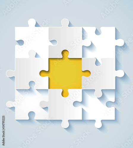 Paper puzzle with yellow the middle for business concepts
