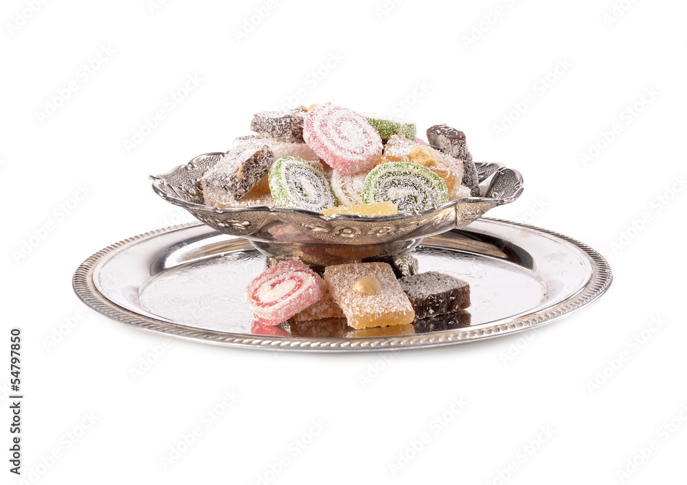 Naklejka premium Turkish delight in a traditional metal container