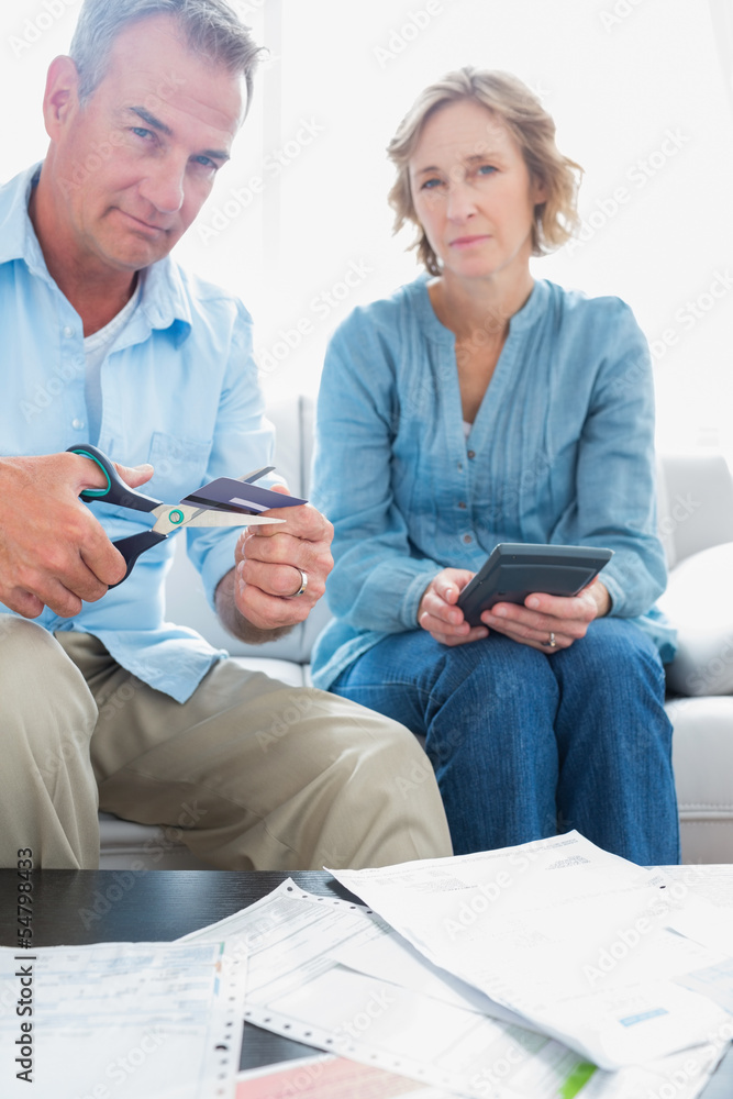 custom made wallpaper toronto digitalHusband cutting credit card in half with wife with bills on the
