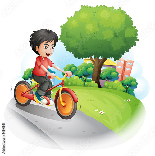 A boy with a red shirt biking